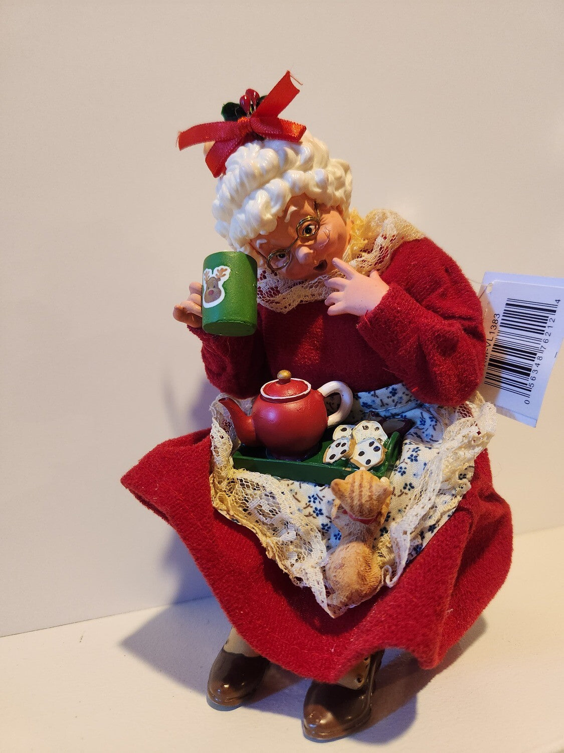 Ms. Claus Sitting Having Tea